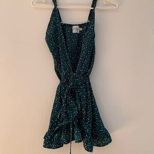 green wrap around polka dot dress